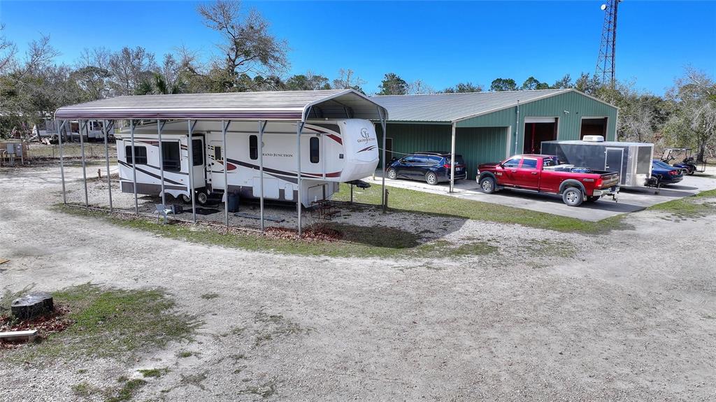 19550 Jody Morgan Road Perry, FL 32348 - Photo 4 of 79 a front view of a house with garden