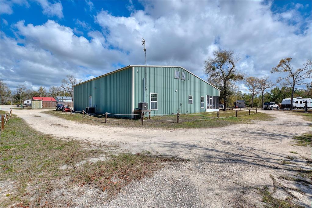 19550 Jody Morgan Road Perry, FL 32348 - Photo 43 of 79 a front view of a house with a yard