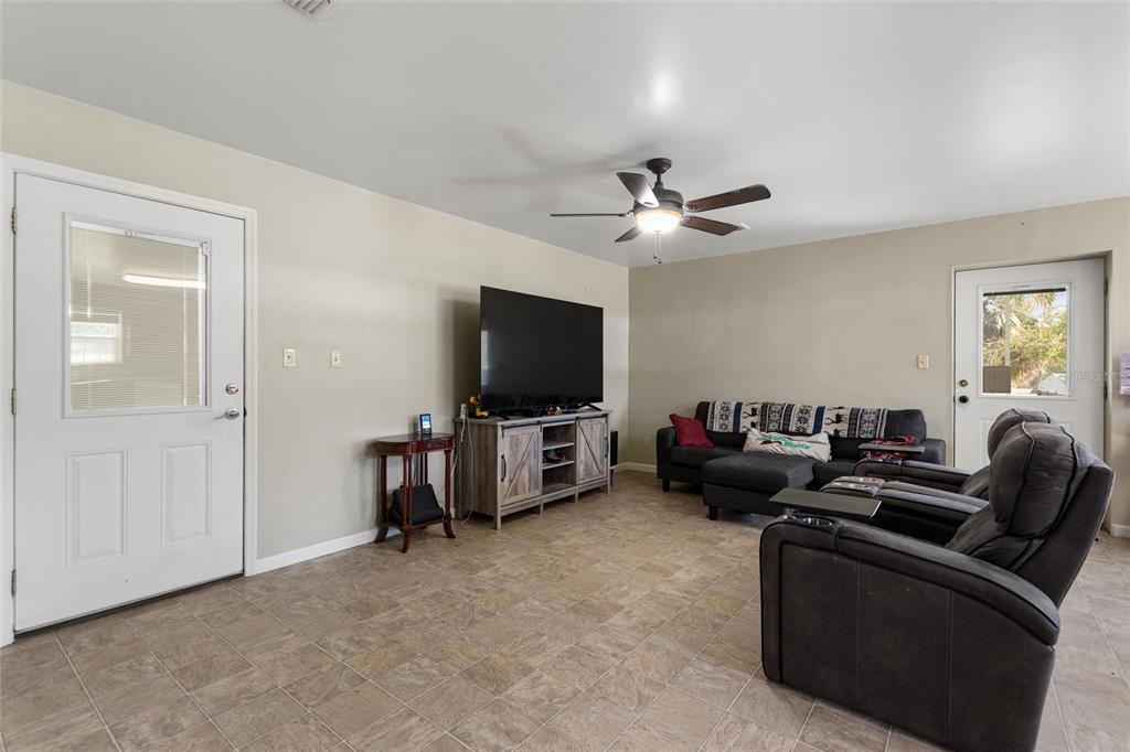 19550 Jody Morgan Road Perry, FL 32348 - Photo 58 of 79 a living room with furniture and a flat screen tv