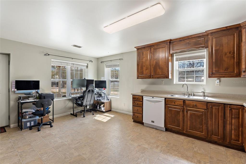 19550 Jody Morgan Road Perry, FL 32348 - Photo 63 of 79 a living room with furniture and a flat screen tv