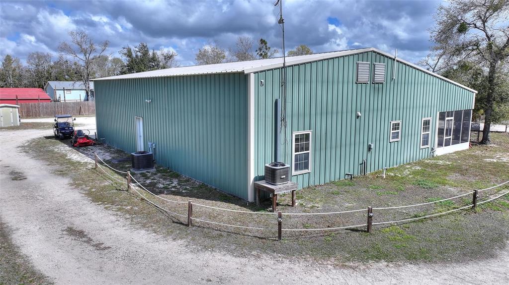 19550 Jody Morgan Road Perry, FL 32348 - Photo 7 of 79 a front view of a house with a yard