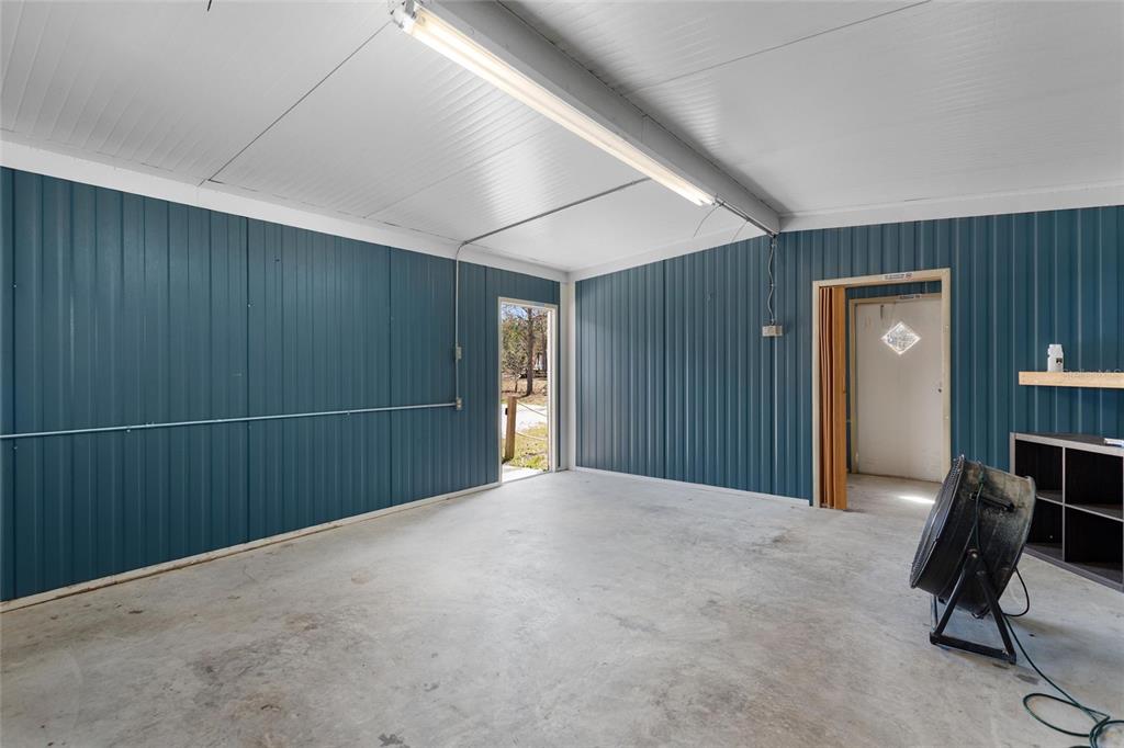 19550 Jody Morgan Road Perry, FL 32348 - Photo 76 of 79 a view of a livingroom with furniture and gym equipment