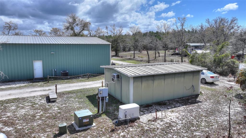 19550 Jody Morgan Road Perry, FL 32348 - Photo 8 of 79 a view of a backyard with a tub and trees