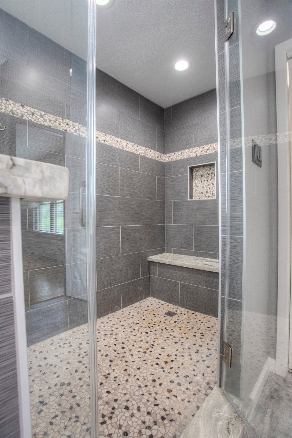 479 Cherry Hills Drive Huntsville, TX 77340 - Photo 11 of 49 a bathroom with a shower