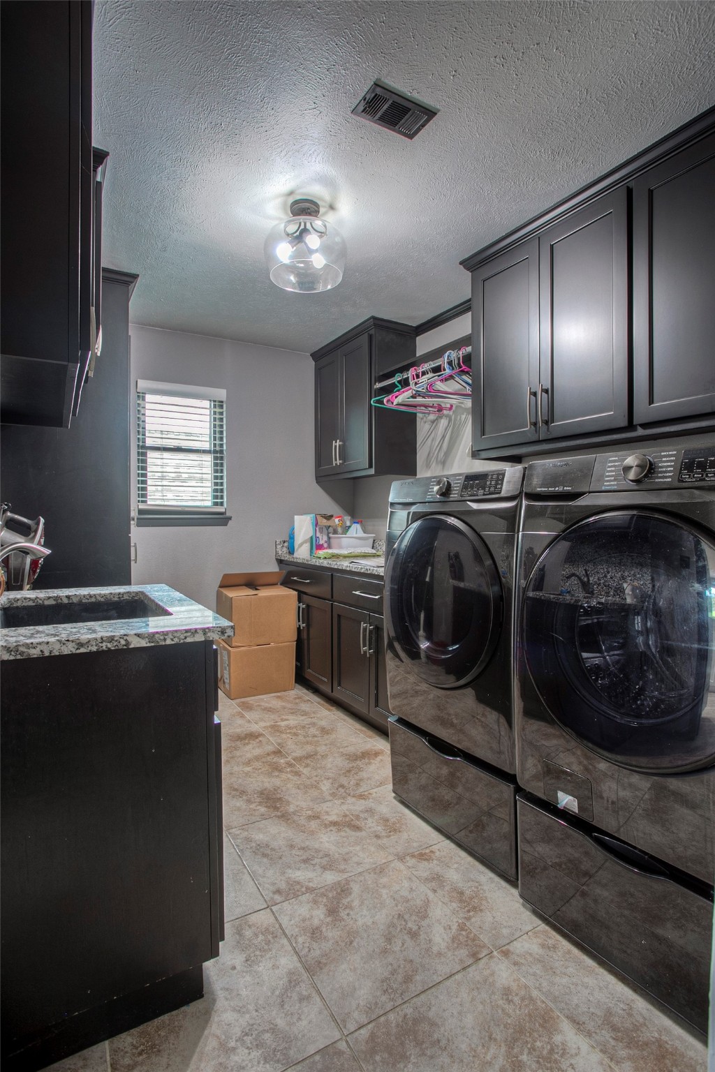 479 Cherry Hills Drive Huntsville, TX 77340 - Photo 27 of 49 a bed room with a bed and furniture