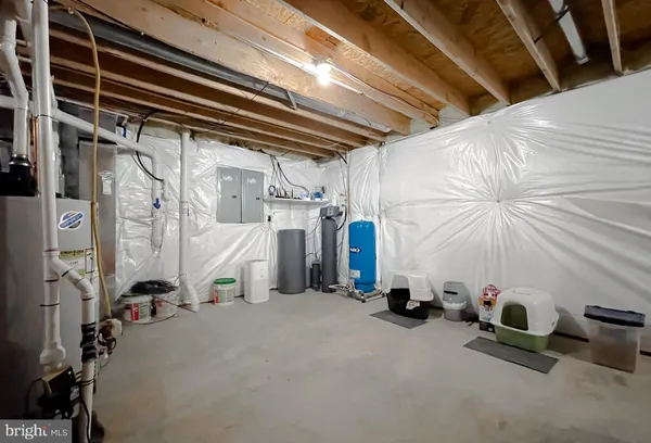 a view of a chairs and table on the wooden floor