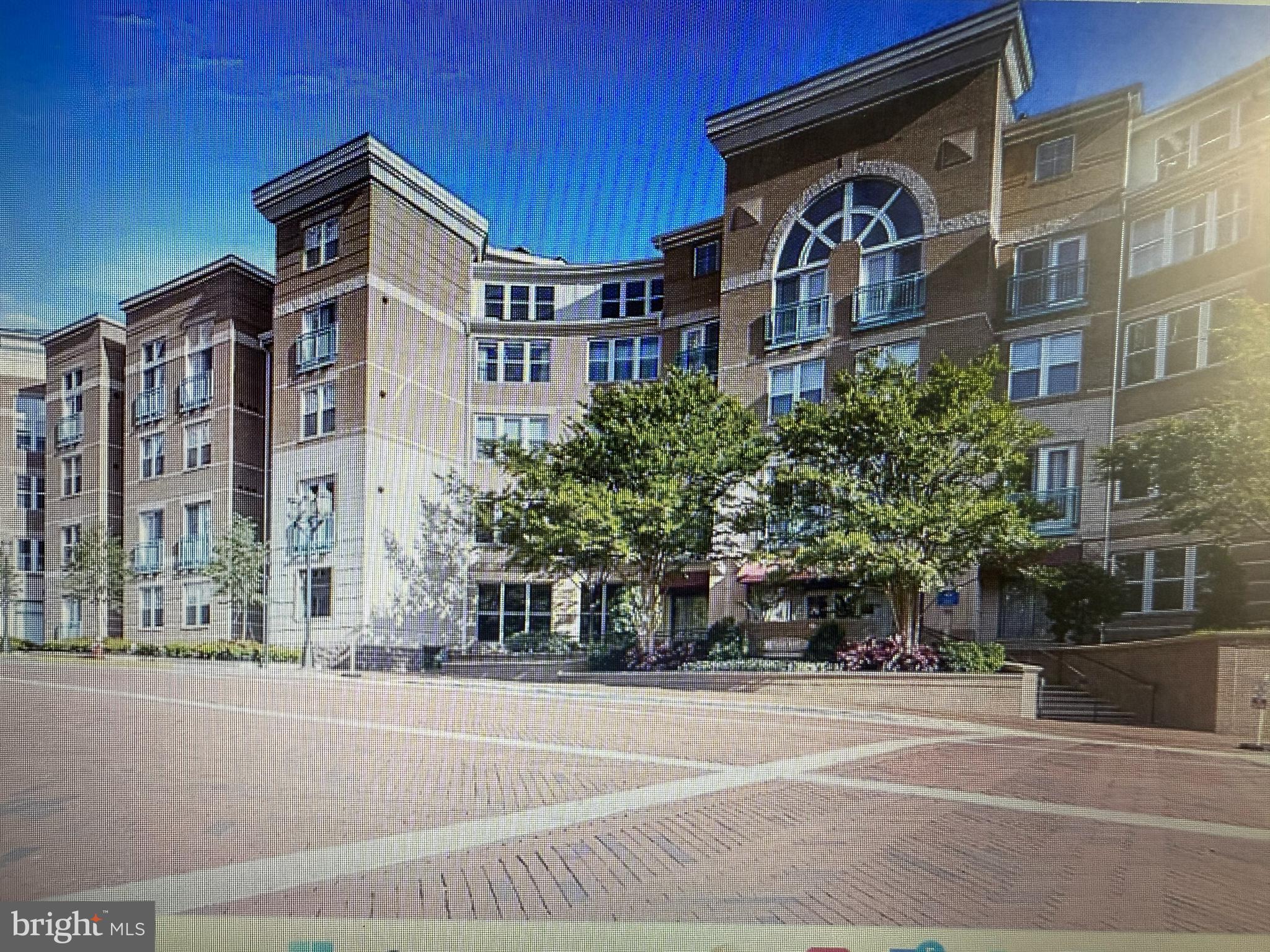a view of a building with a street