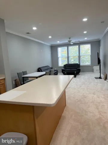 a kitchen with a appliances a sink and a cabinets