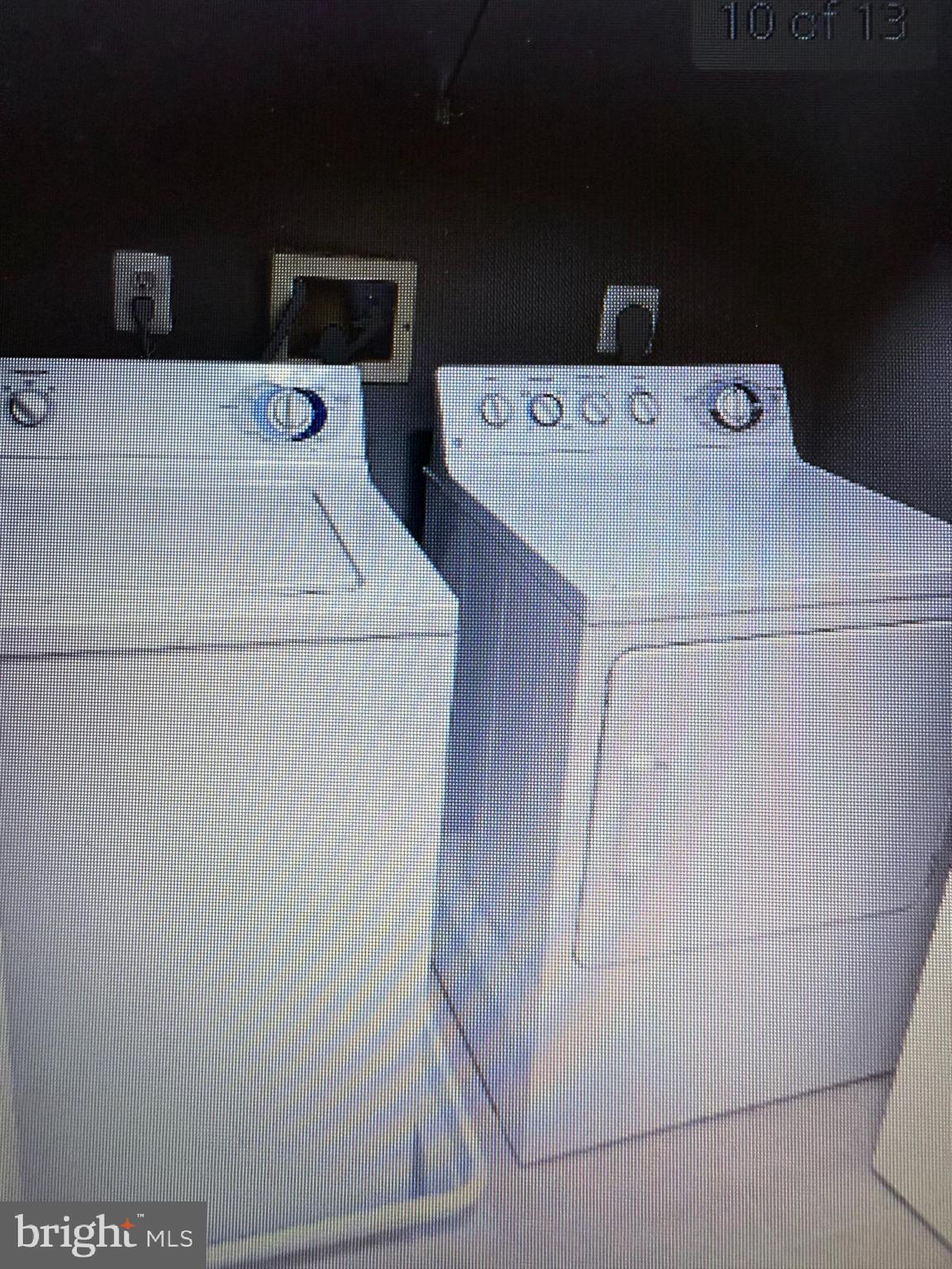 12001 Market Street, Unit 171 Reston, VA 20190 - Photo 10 of 10 a utility room with dryer and washer