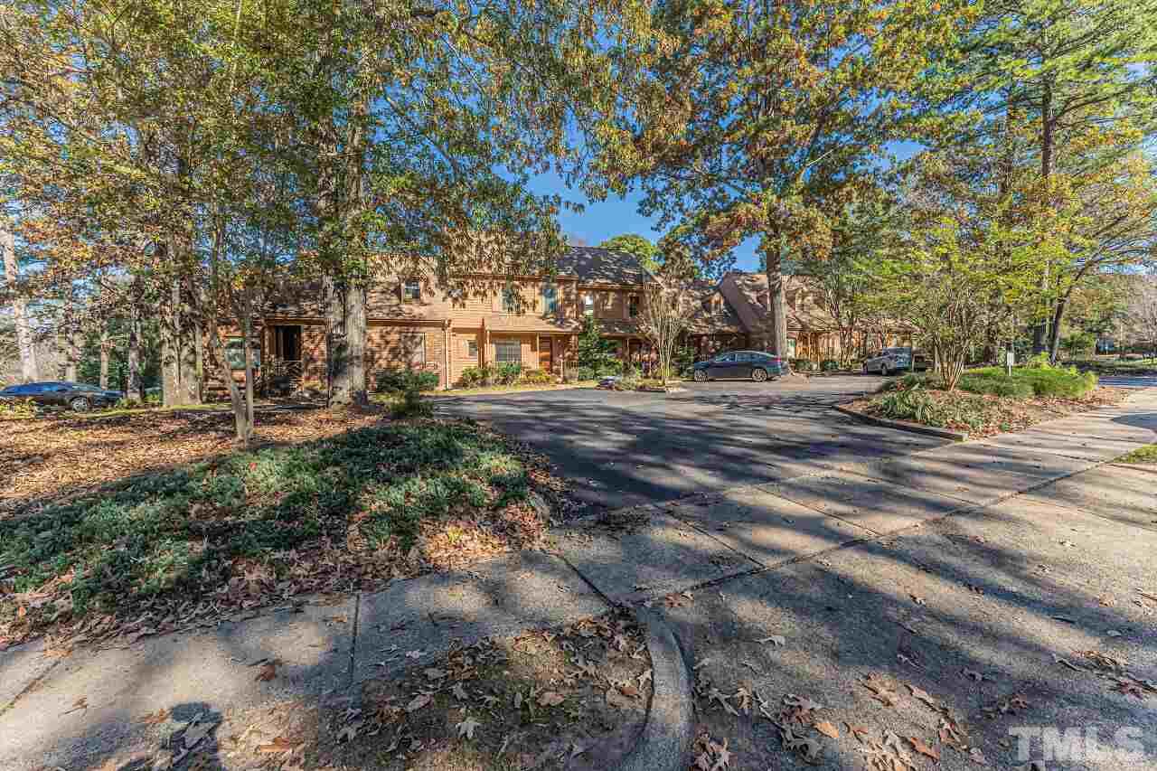 2616 Sawmill Road Raleigh, NC 27613 - Photo 16 of 18 a view of road with large trees