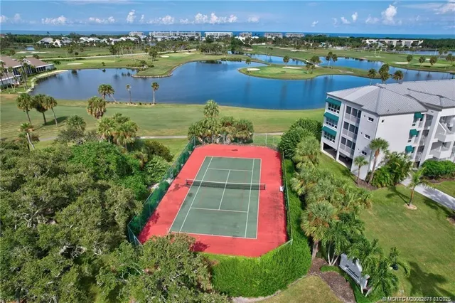 an aerial view of a house with a garden