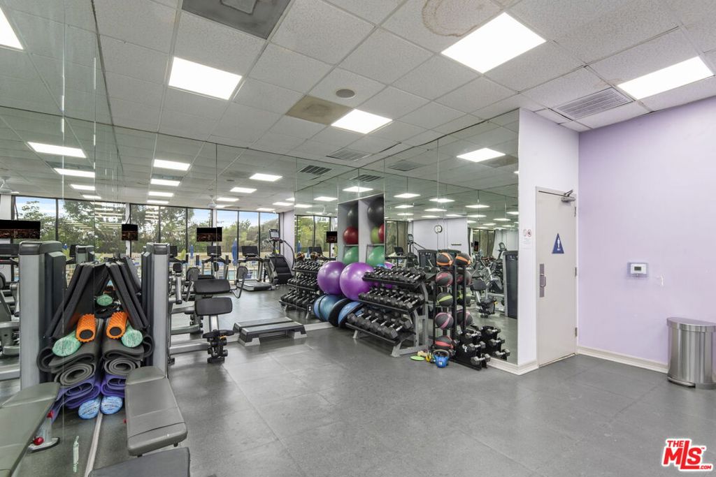 2160 Century Hill, Unit 104N Los Angeles, CA 90067 - Photo 20 of 26 a view of a room with gym equipment