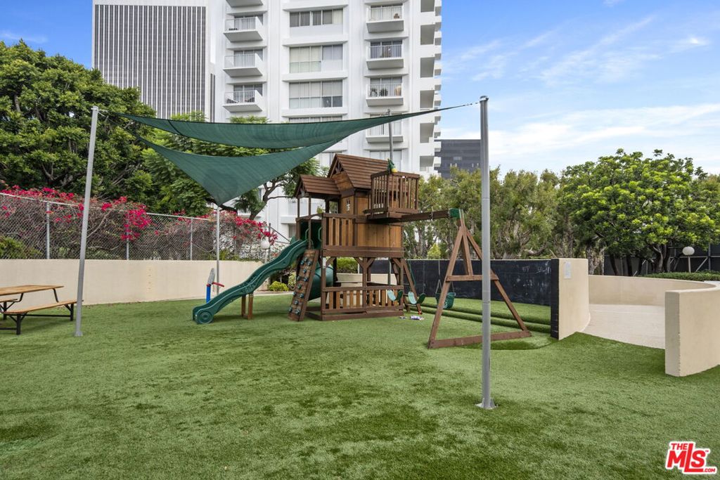 2160 Century Hill, Unit 104N Los Angeles, CA 90067 - Photo 22 of 26 a view of a park with swings