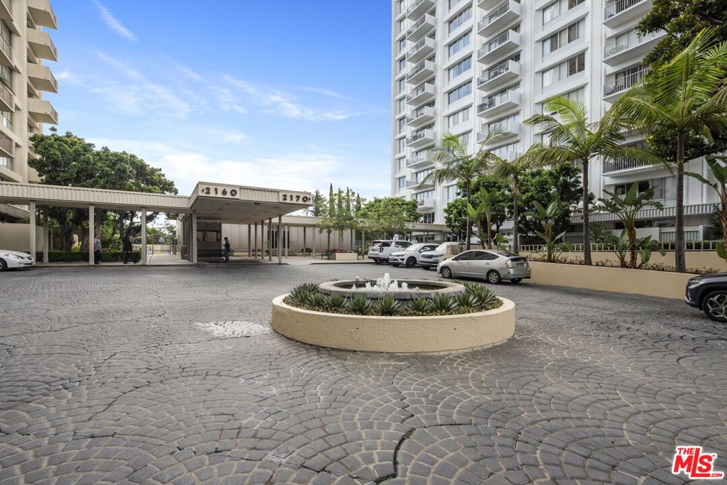 2160 Century Hill, Unit 104N Los Angeles, CA 90067 - Photo 25 of 26 a swimming pool with outdoor seating and yard