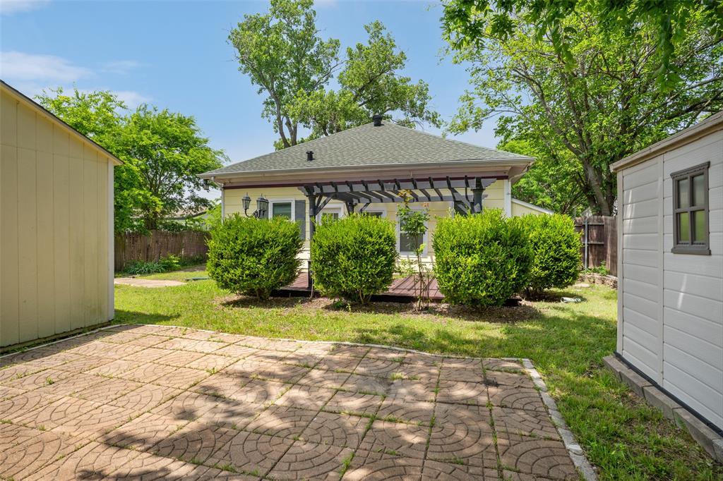 5824 Boone Street Sachse, TX 75048 - Photo 34 of 40 a view of backyard of house with green space