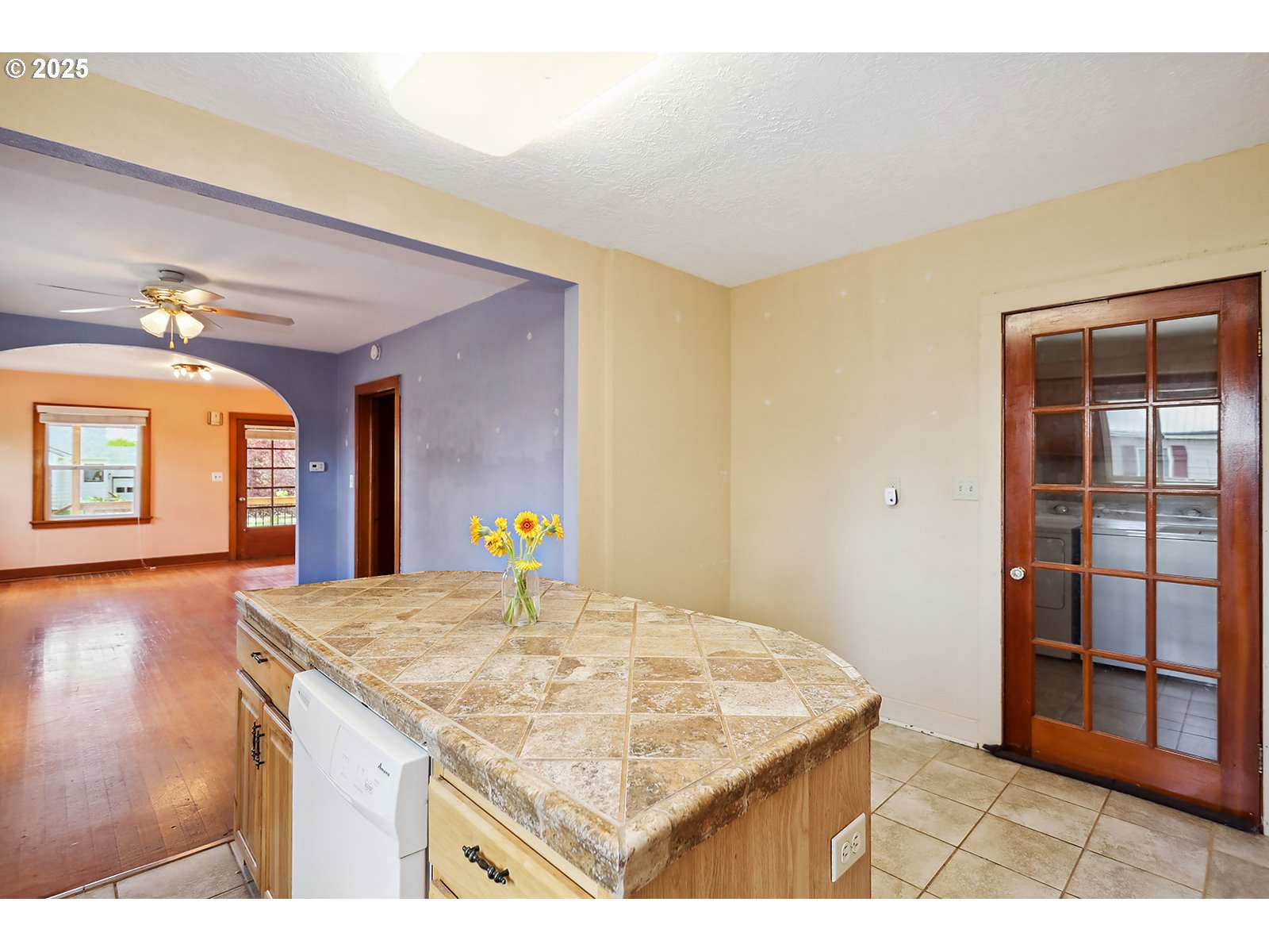 323 West Broadway Street Goldendale, WA 98620 - Photo 12 of 41 a kitchen with kitchen island sink and refrigerator