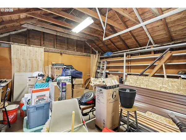 a view of a bathroom with sink and mirror