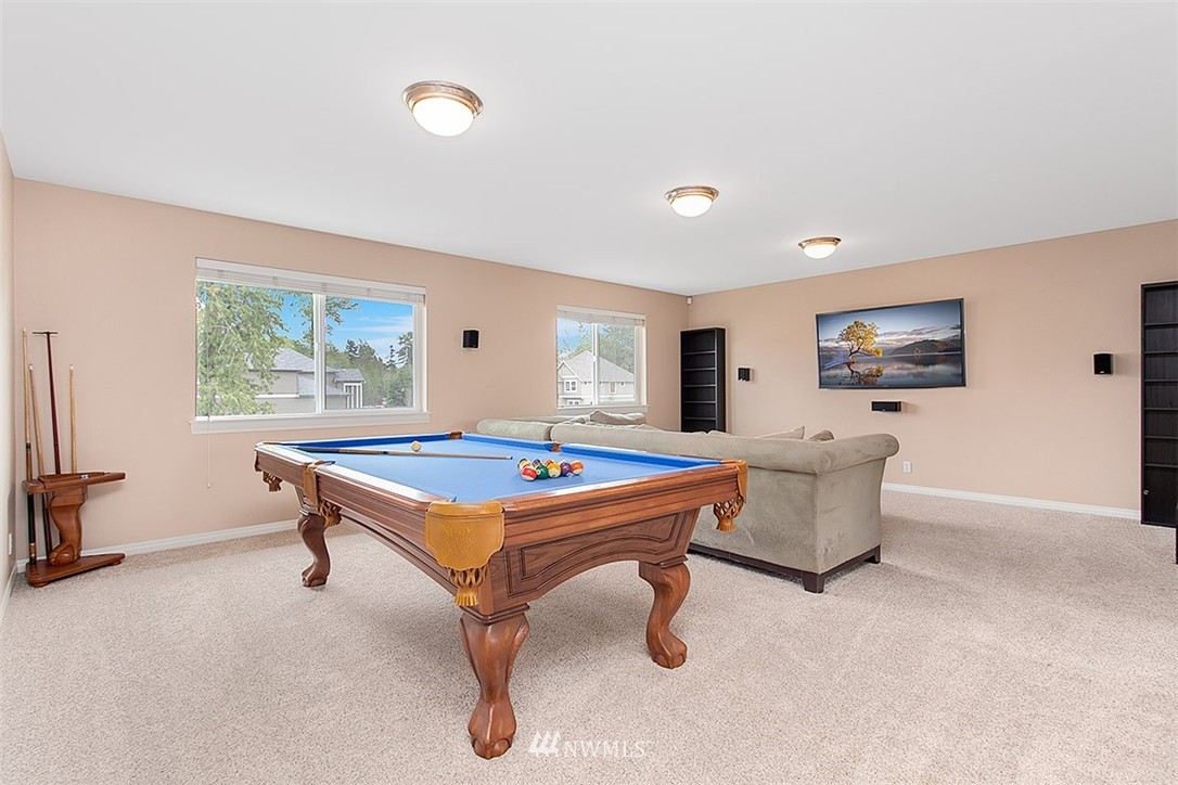 258 Lyons Place Northeast Renton, WA 98059 - Photo 16 of 25 a room with furniture pool table and windows