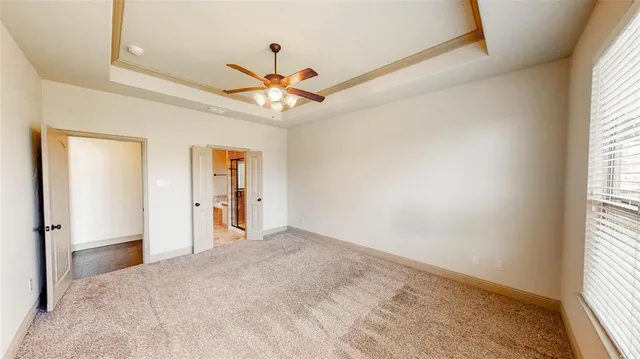 a kitchen with stainless steel appliances granite countertop wooden cabinets a stove top oven a sink and dishwasher