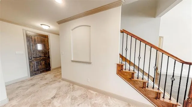 a view of hallway with wooden floor