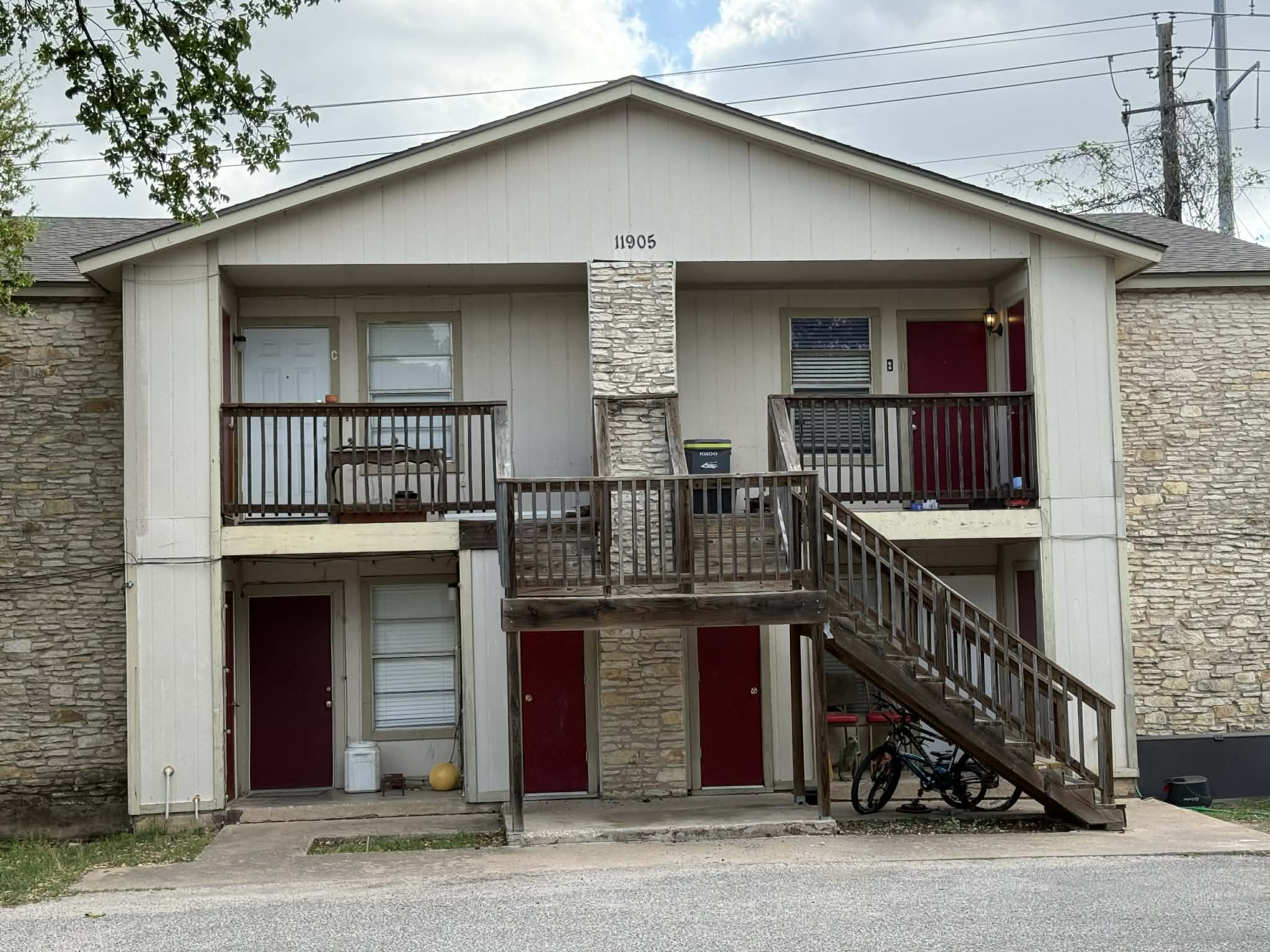 11905 Alpheus Avenue Austin, TX 78759 - Photo 1 of 23 a front view of house with deck