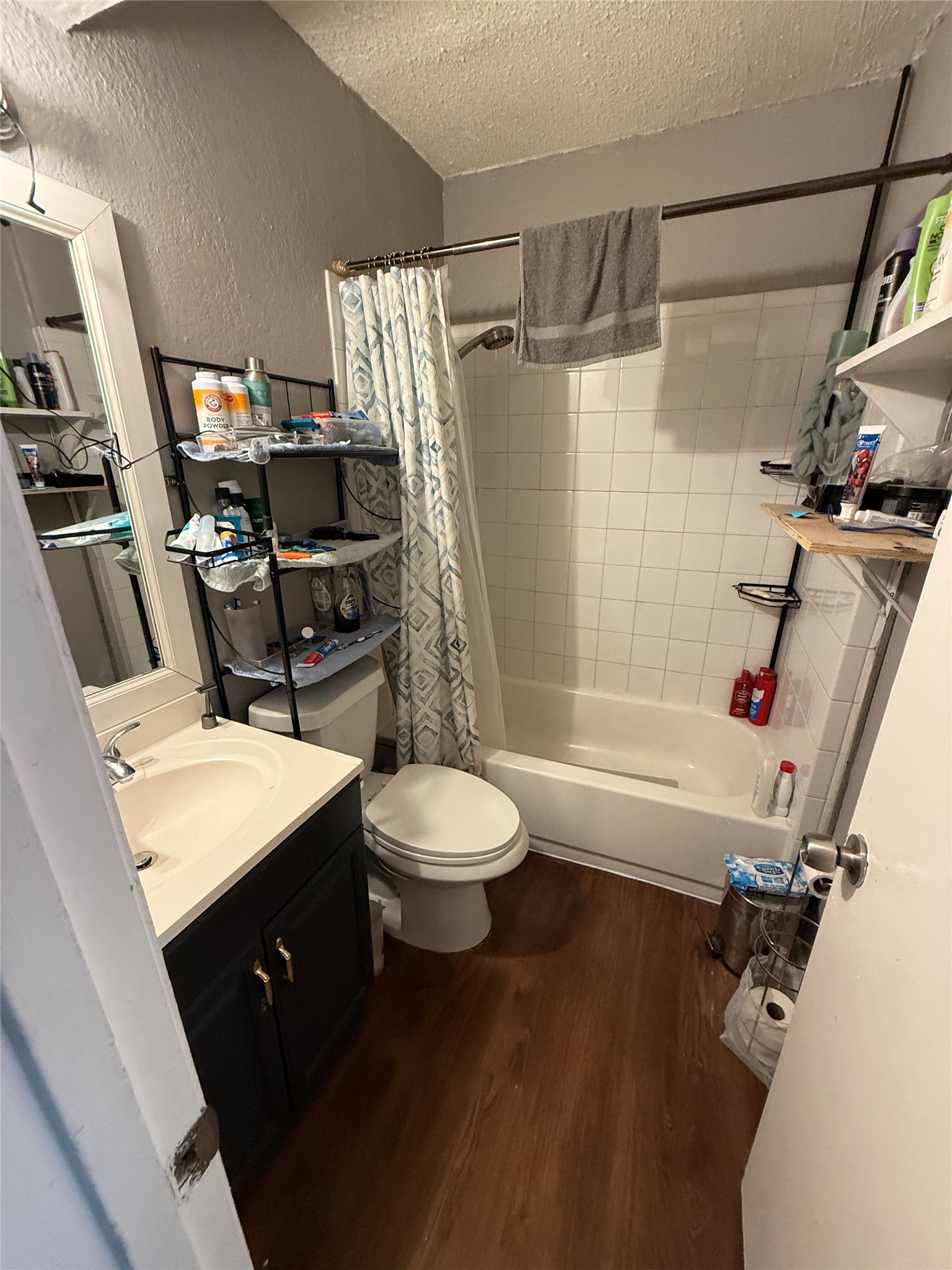 11905 Alpheus Avenue Austin, TX 78759 - Photo 12 of 23 a bathroom with a sink toilet tub and shower
