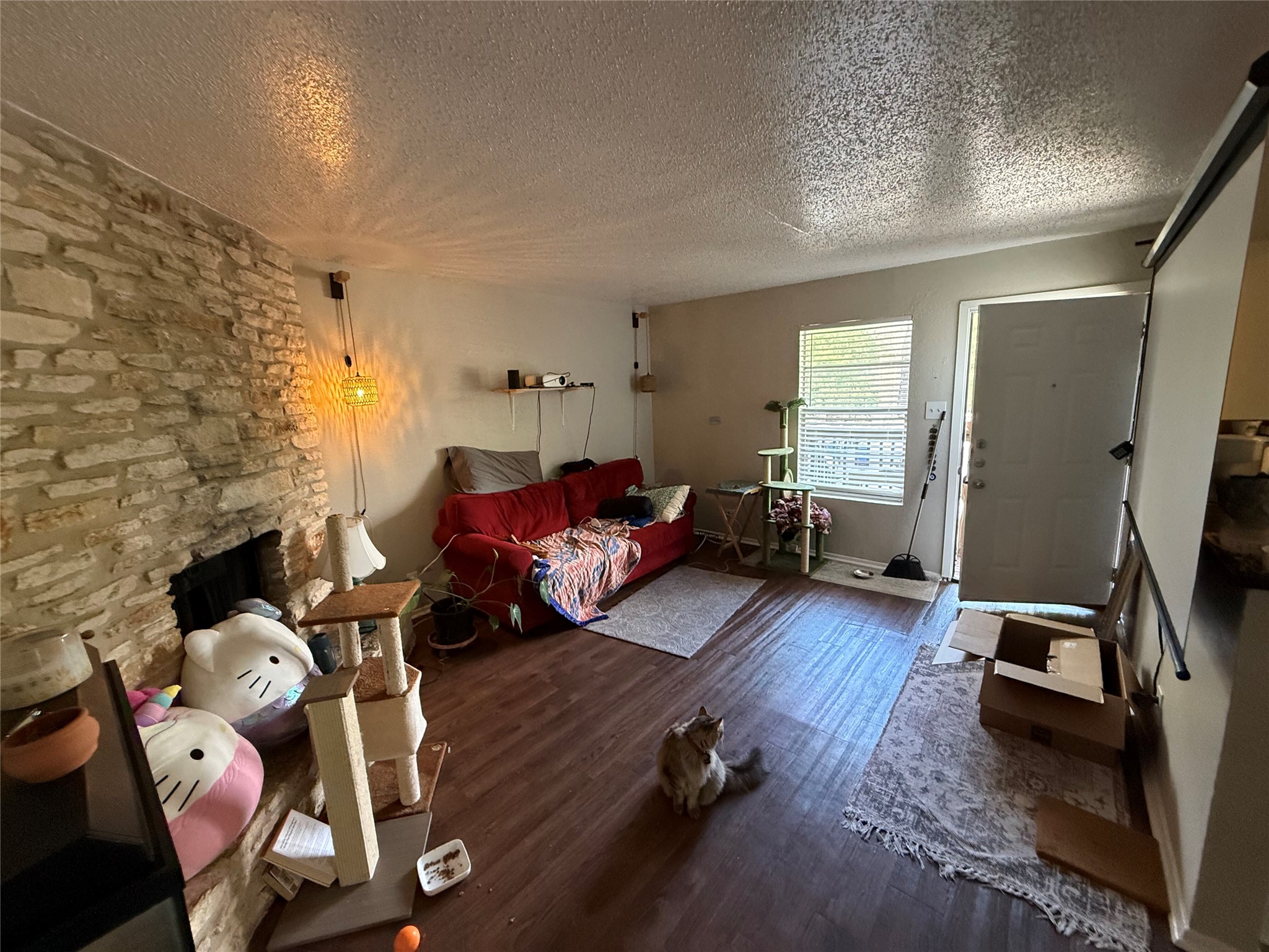 11905 Alpheus Avenue Austin, TX 78759 - Photo 15 of 23 a living room with furniture or couch and a flat screen tv