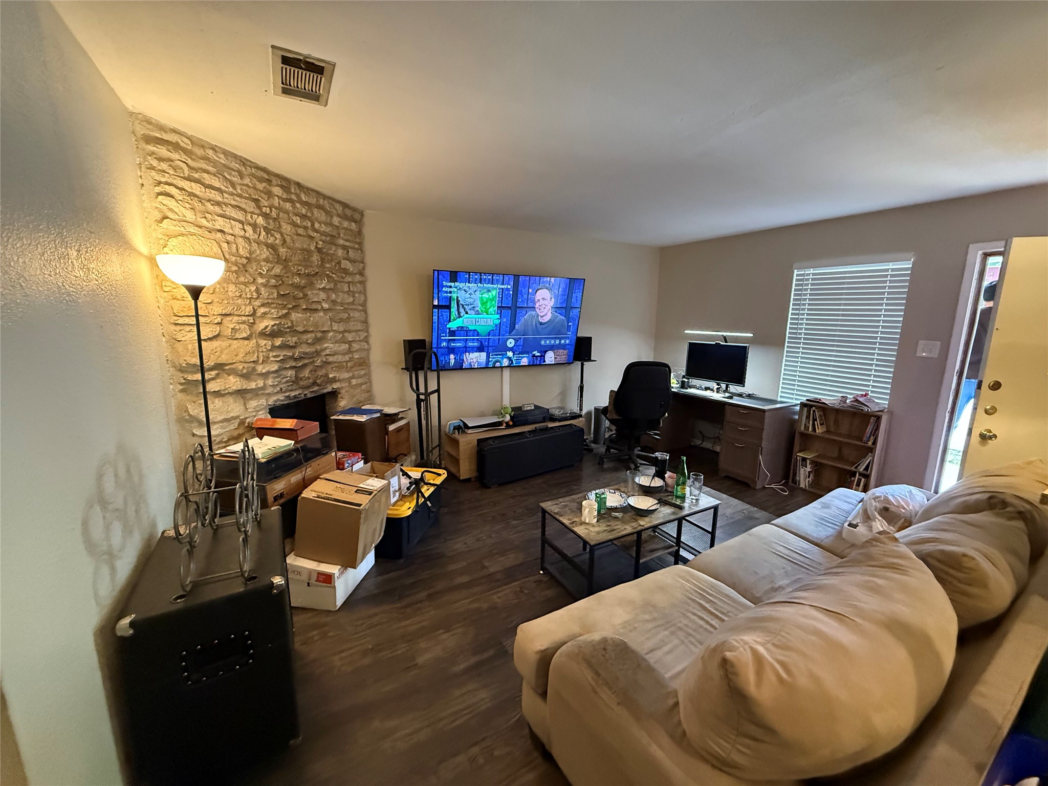 11905 Alpheus Avenue Austin, TX 78759 - Photo 3 of 23 a living room with furniture and a flat screen tv