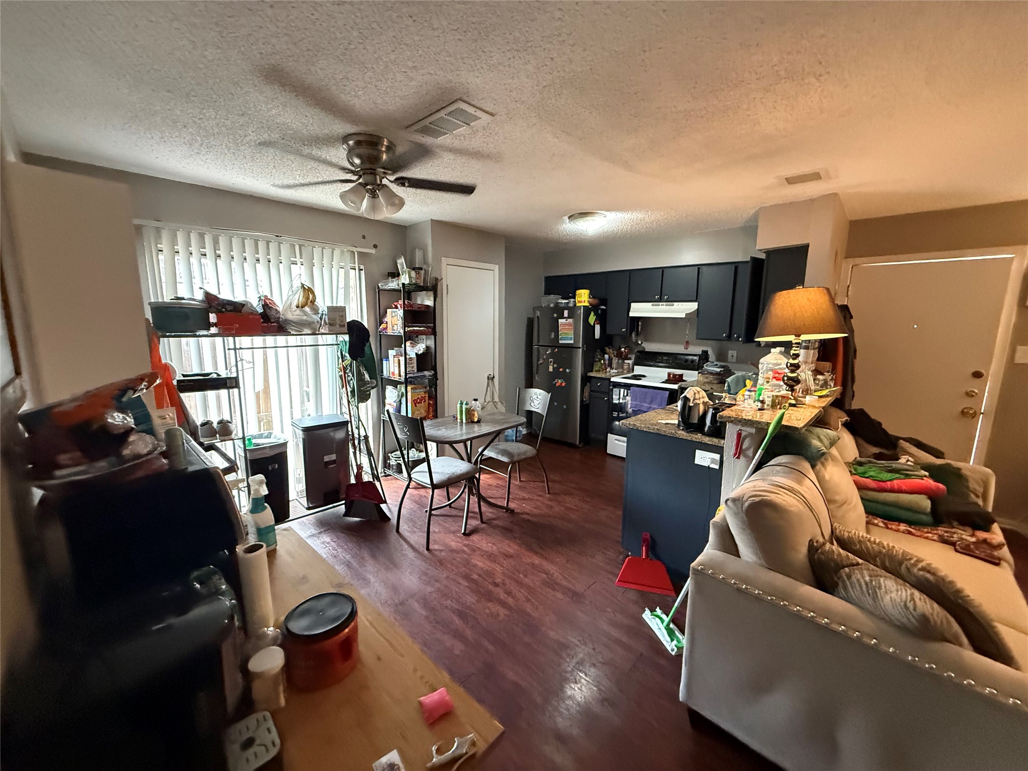 11905 Alpheus Avenue Austin, TX 78759 - Photo 8 of 23 a living room with furniture and wooden floor