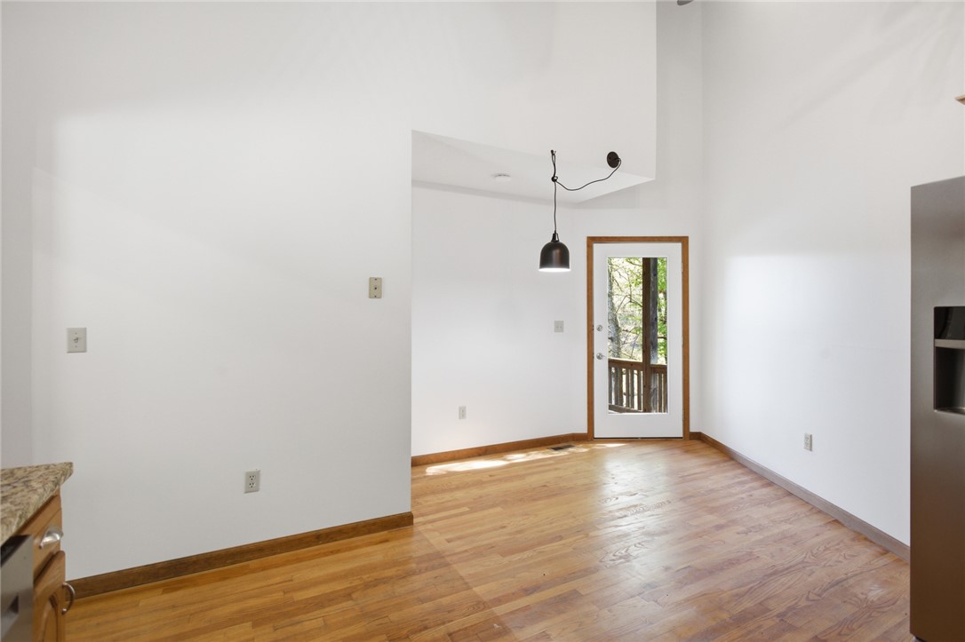 120 Farris Sandra Road West Union, SC 29696 - Photo 12 of 50 This bright space features an inviting doorway to the outdoors and durable hardwood floors.