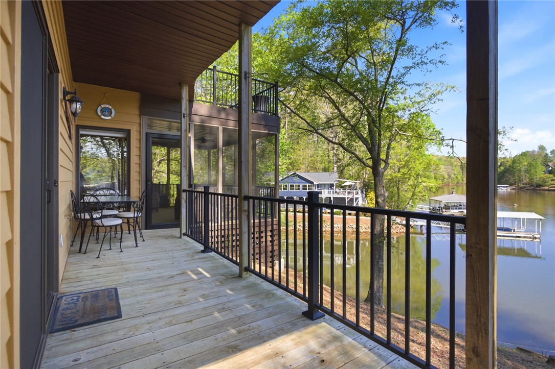 120 Farris Sandra Road West Union, SC 29696 - Photo 16 of 50 This inviting patio offers panoramic water views, perfect for peaceful enjoyment and outdoor living.