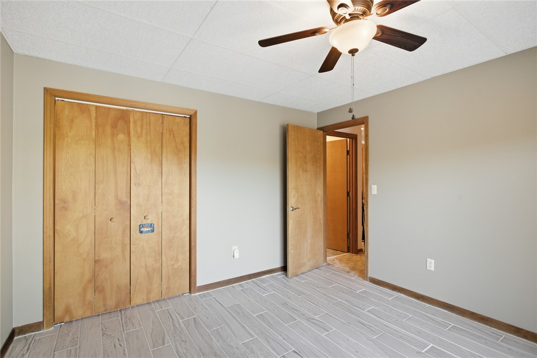 120 Farris Sandra Road West Union, SC 29696 - Photo 26 of 50 This spacious room features elegant wood flooring and a modern ceiling fan, offering comfort and style.