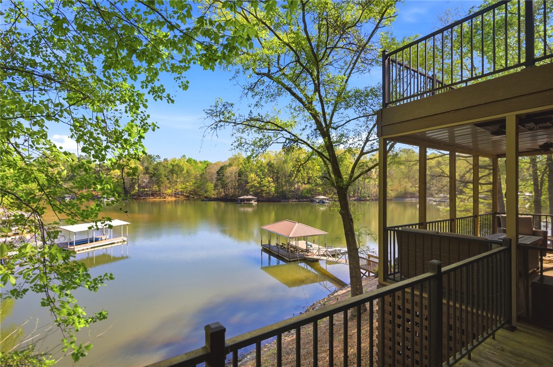120 Farris Sandra Road West Union, SC 29696 - Photo 33 of 50 This tranquil lakeside retreat features a private dock and expansive water views from multiple levels.