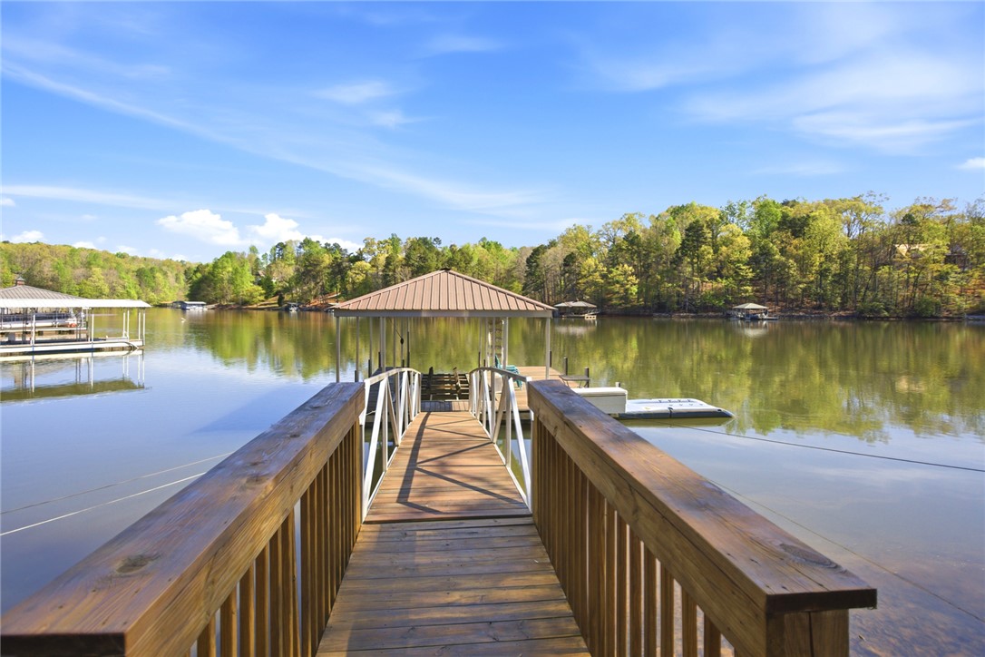 120 Farris Sandra Road West Union, SC 29696 - Photo 34 of 50 This serene lakeside property offers direct access to the water with a private dock and scenic views.