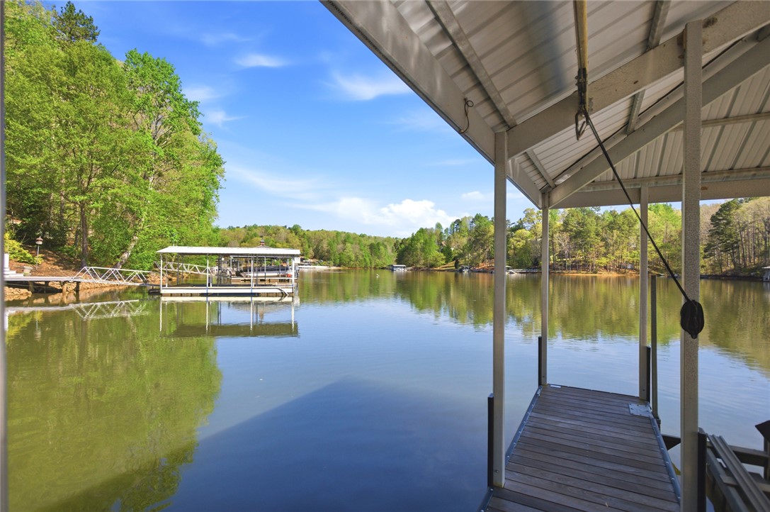 120 Farris Sandra Road West Union, SC 29696 - Photo 35 of 50 This serene waterfront property offers direct lake access with a private dock.