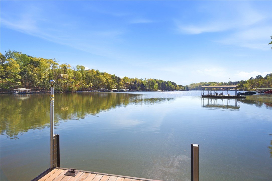 120 Farris Sandra Road West Union, SC 29696 - Photo 37 of 50 This serene lakefront property offers tranquil waters and lush greenery, perfect for a peaceful escape.