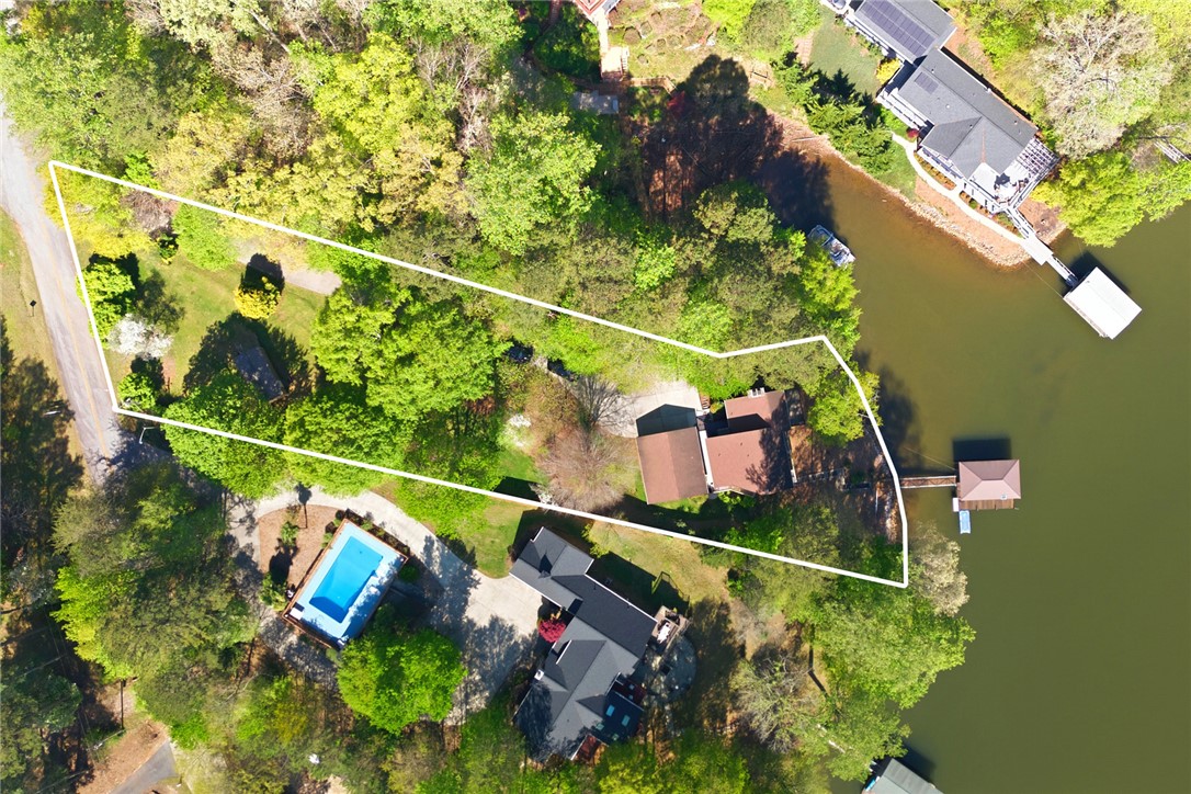 120 Farris Sandra Road West Union, SC 29696 - Photo 38 of 50 This aerial view showcases a picturesque waterfront property with lush greenery.