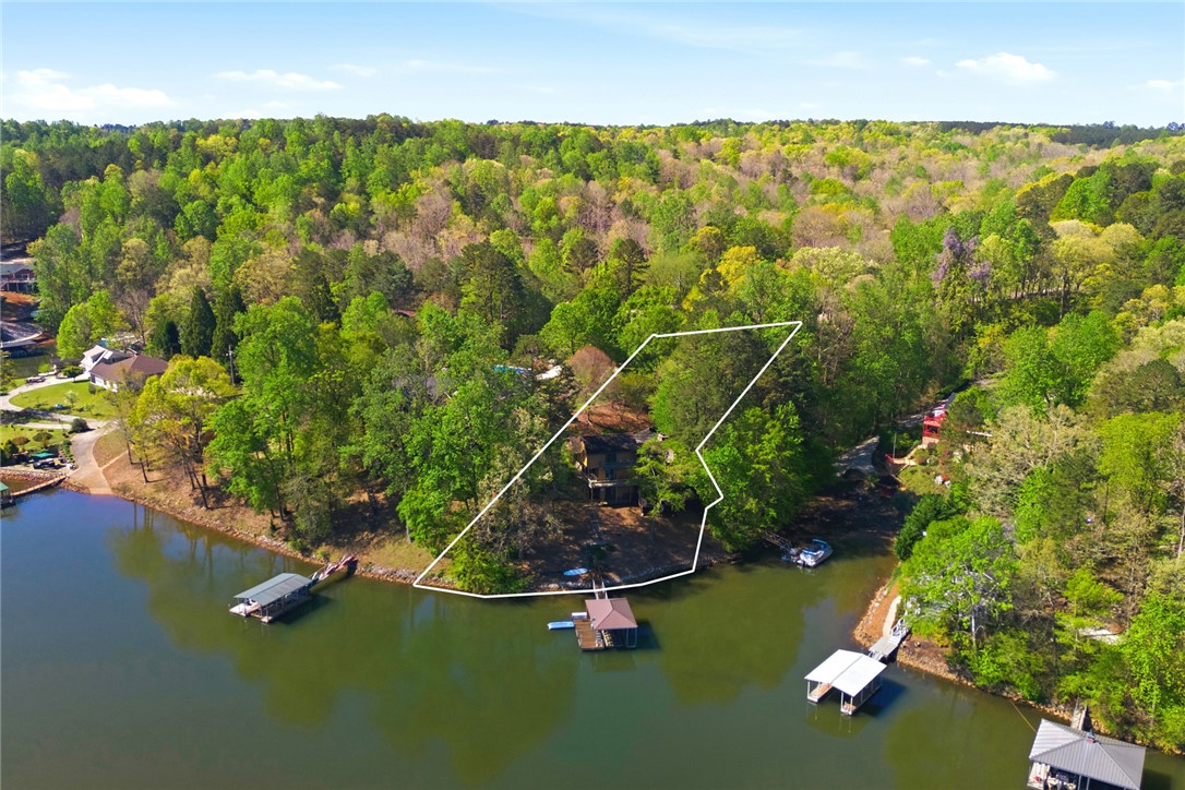 120 Farris Sandra Road West Union, SC 29696 - Photo 41 of 50 This serene lakefront property offers expansive water views and lush natural surroundings.