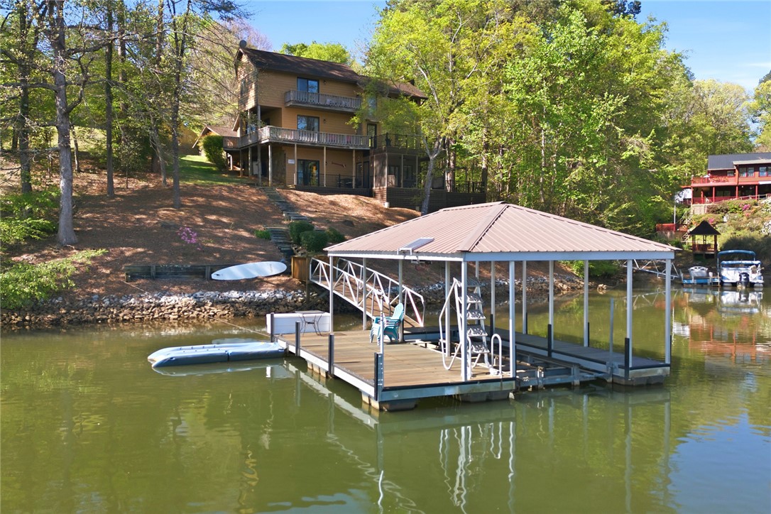 120 Farris Sandra Road West Union, SC 29696 - Photo 44 of 50 This charming lakeside retreat features a private dock and spacious balconies, perfect for enjoying the waterfront.