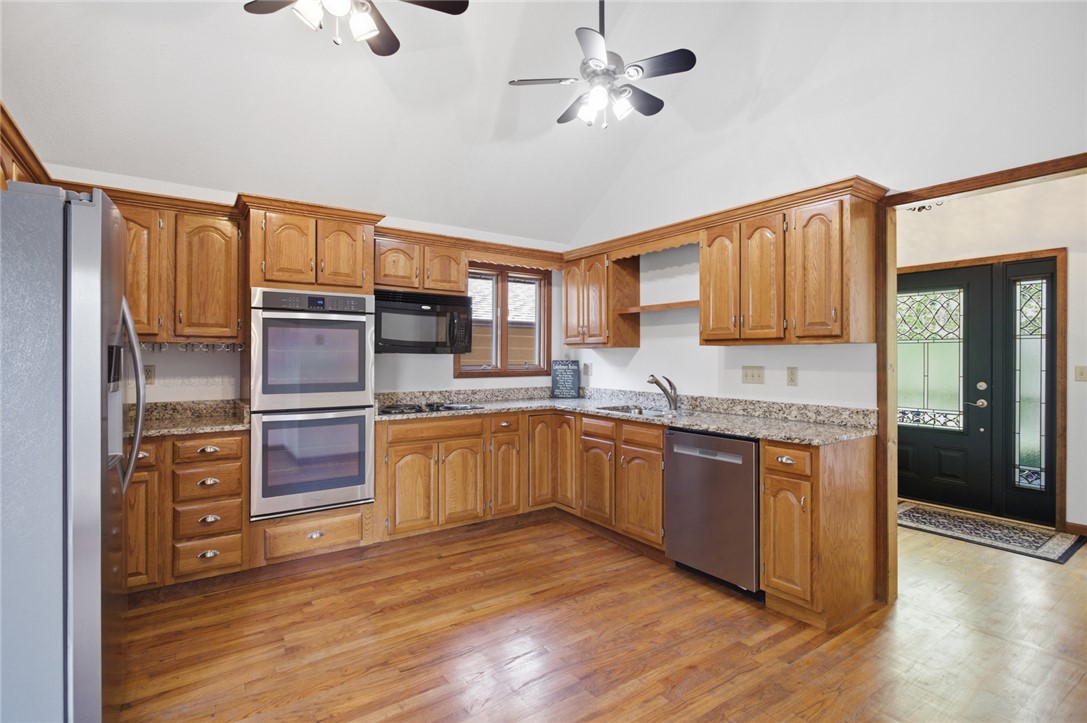 120 Farris Sandra Road West Union, SC 29696 - Photo 9 of 50 This spacious kitchen offers ample cabinetry, modern appliances, and convenient access to the entry foyer.