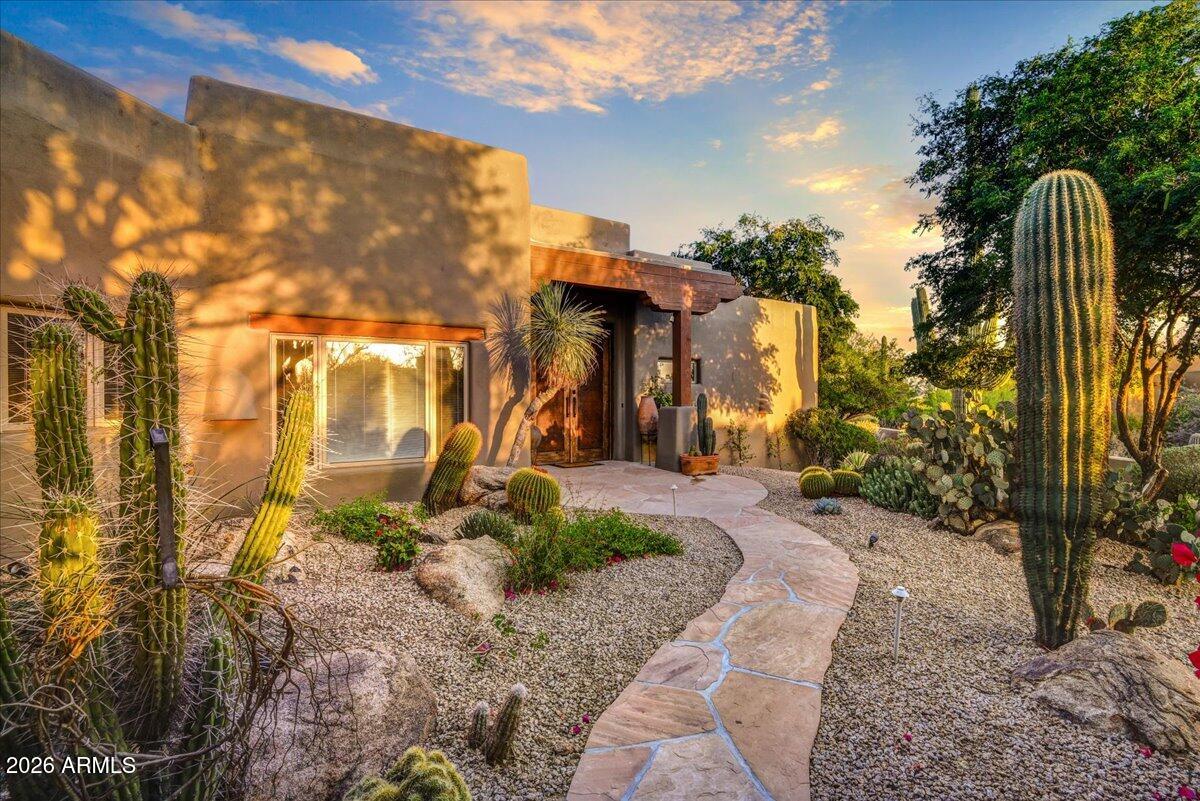 10040 East Happy Valley Road, Unit 404 Scottsdale, AZ 85255 - Photo 2 of 4 a view of a park with iron fence