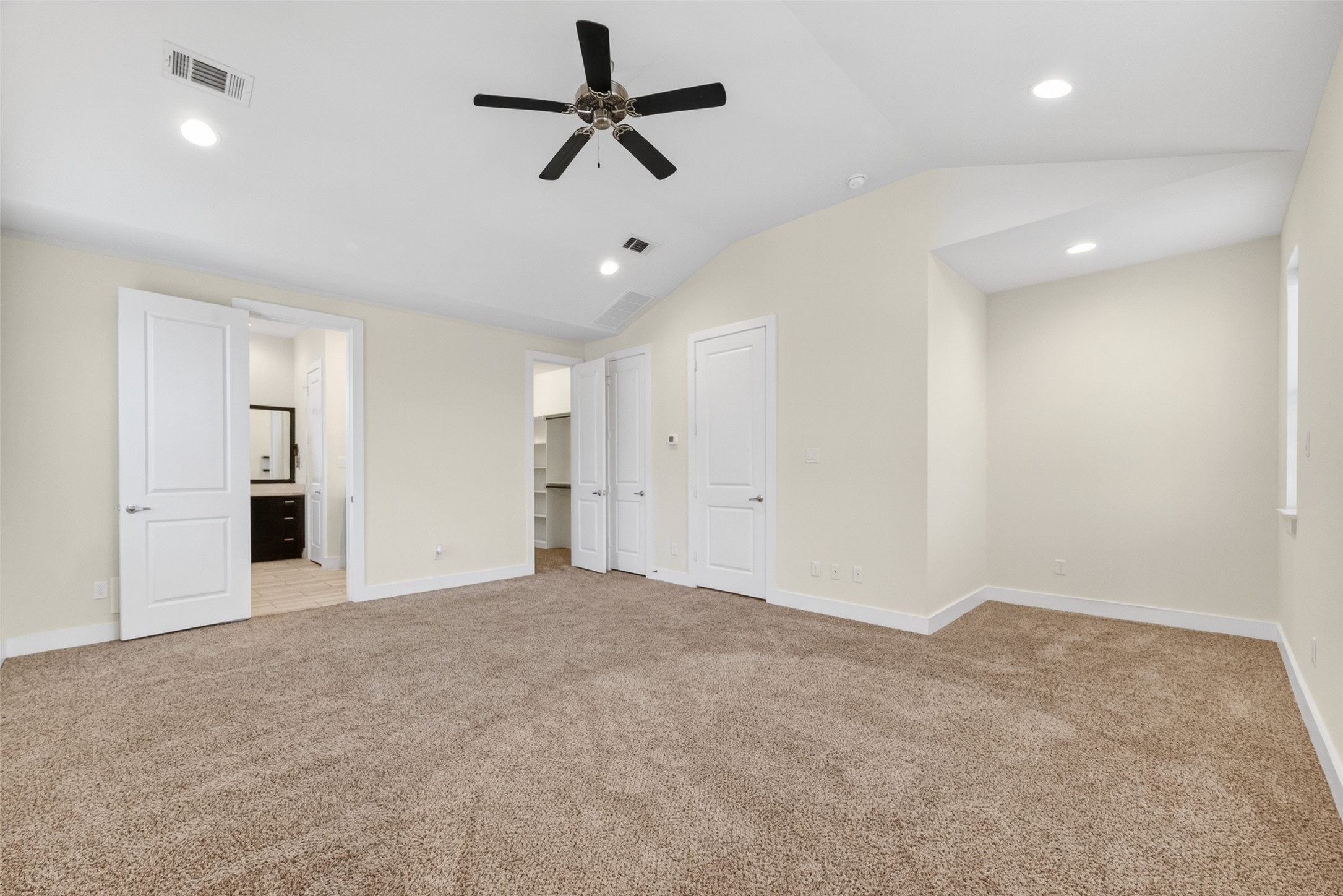 1202 Cedarpost Tree Springs Place Houston, TX 77055 - Photo 20 of 45 an empty room with ceiling fan and windows