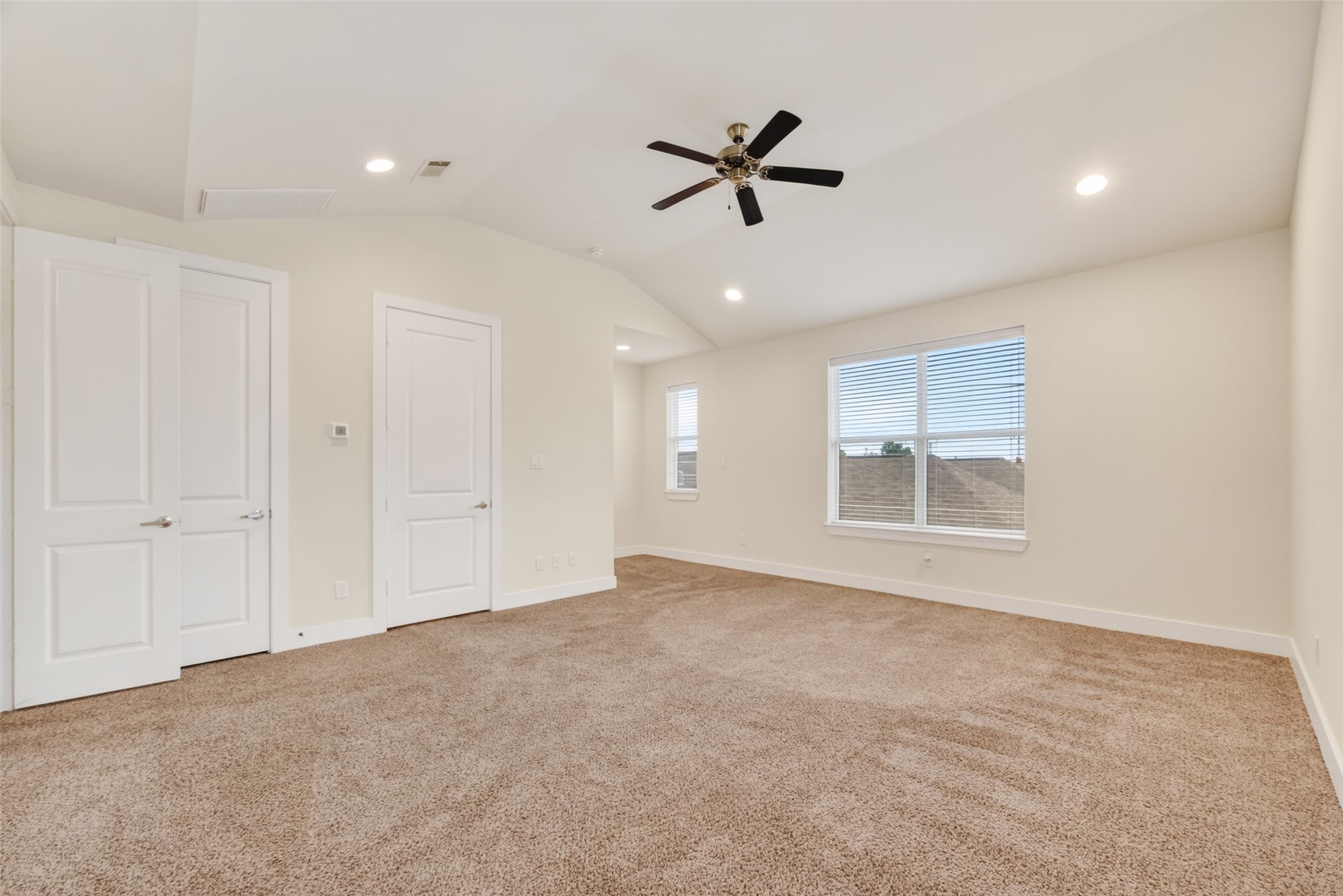 1202 Cedarpost Tree Springs Place Houston, TX 77055 - Photo 21 of 45 a view of an empty room with a window