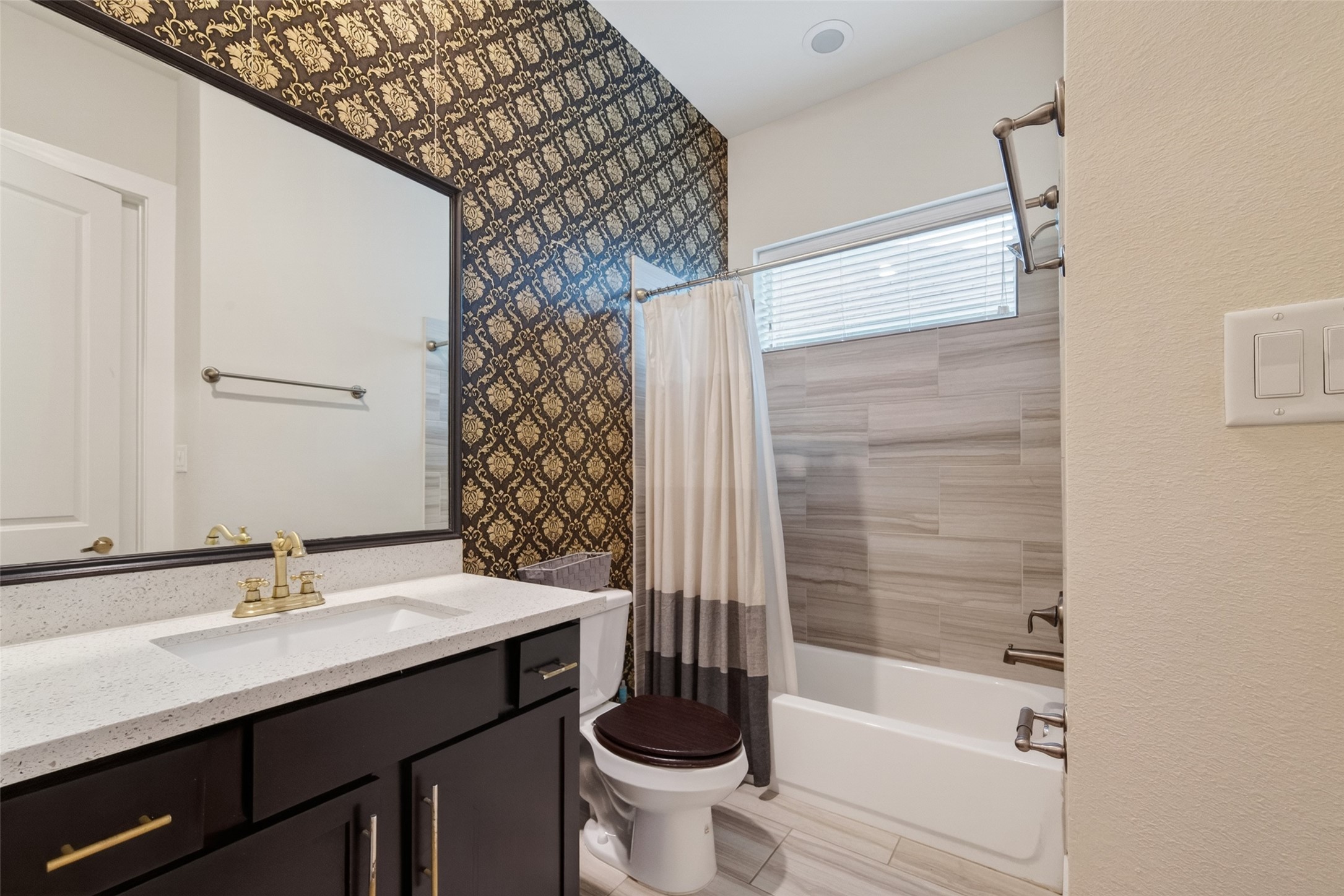 1202 Cedarpost Tree Springs Place Houston, TX 77055 - Photo 30 of 45 a bathroom with a sink a toilet and shower