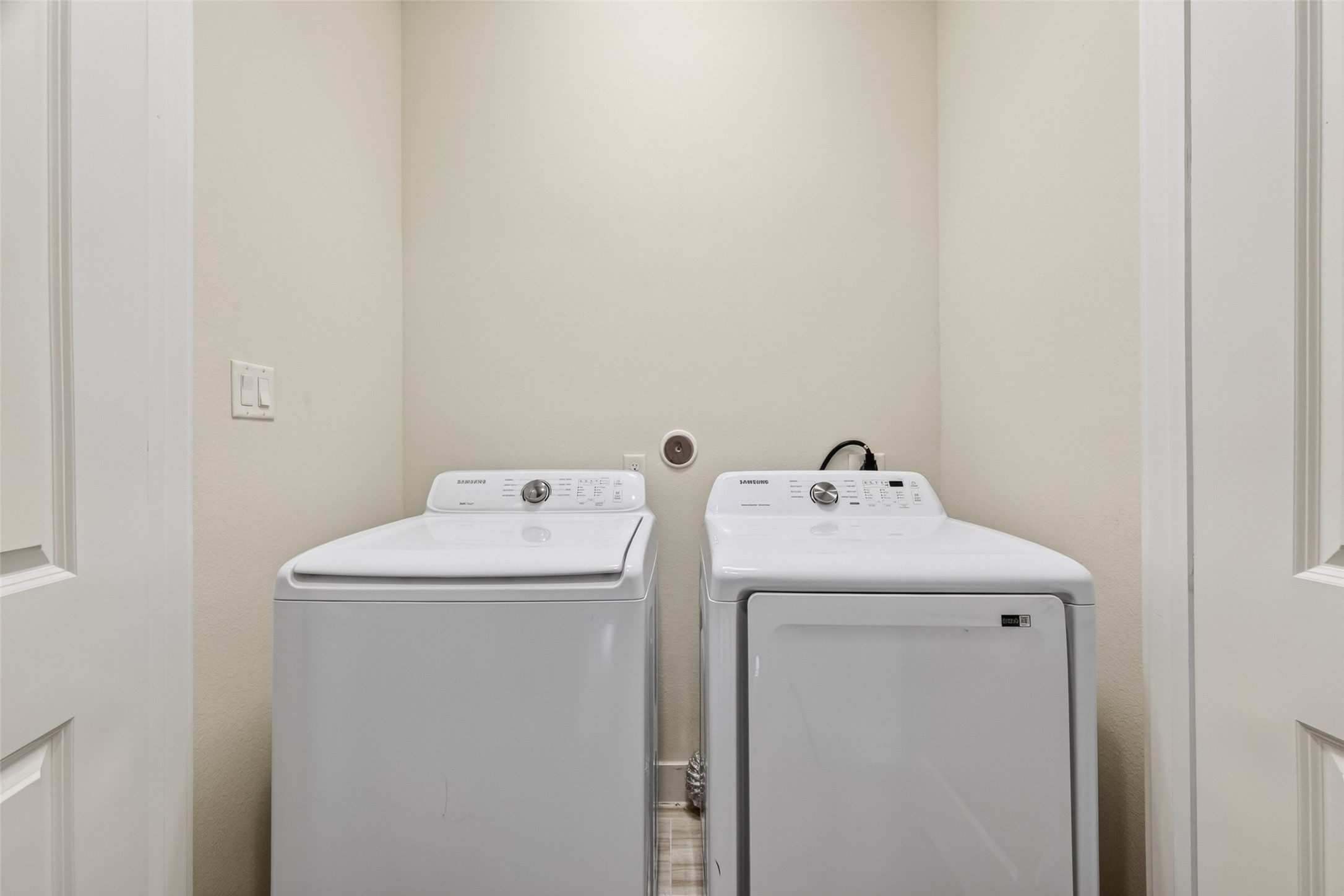 1202 Cedarpost Tree Springs Place Houston, TX 77055 - Photo 39 of 45 a utility room with dryer and washer