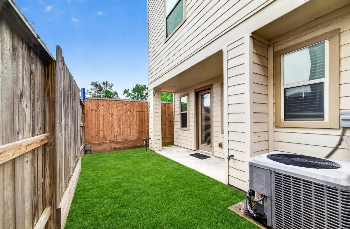 1202 Cedarpost Tree Springs Place Houston, TX 77055 - Photo 41 of 45 a view of a house with backyard and porch