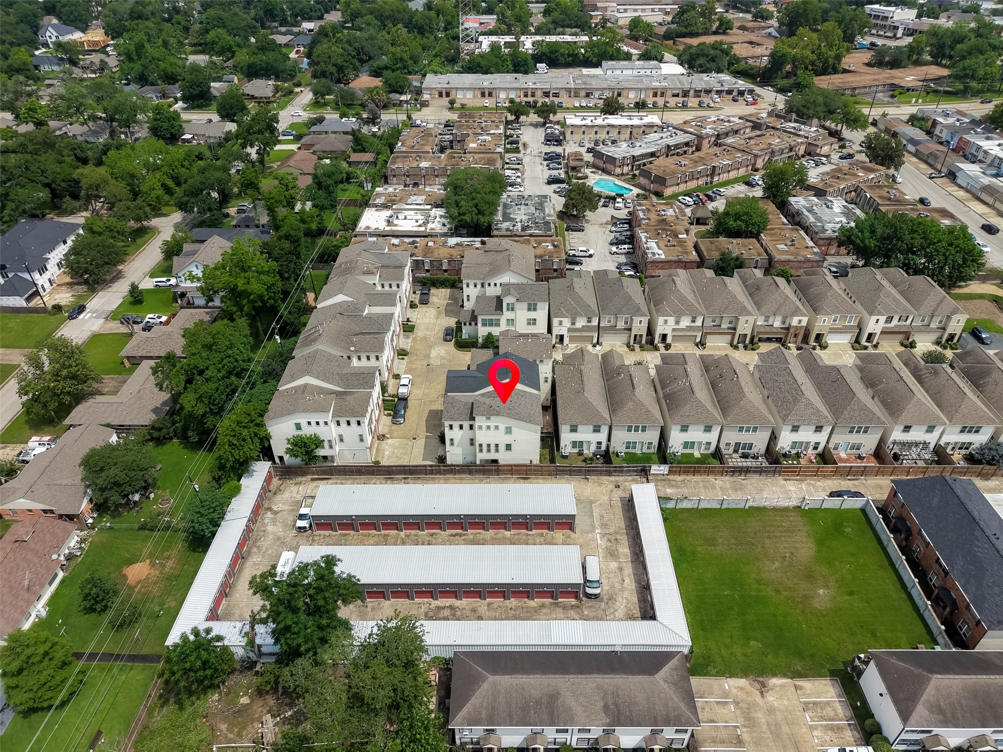 1202 Cedarpost Tree Springs Place Houston, TX 77055 - Photo 44 of 45 an aerial view of a pool