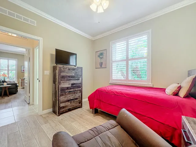 a view of a house with backyard and garden