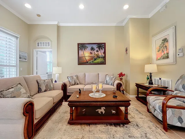 a living room with furniture and a couch
