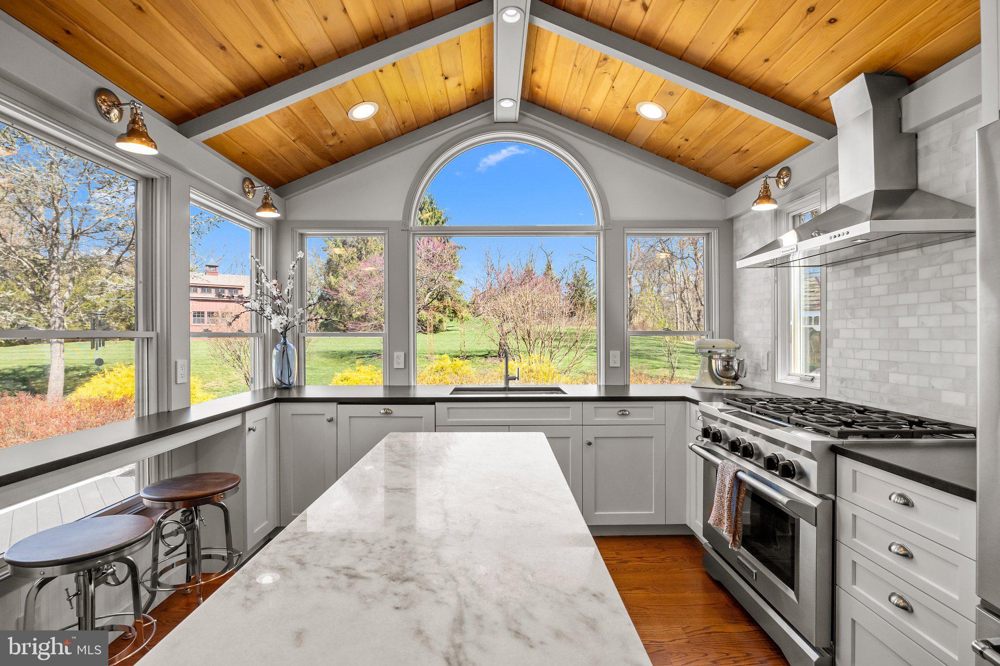 85 Brownsburg Road Newtown, PA 18940 - Photo 15 of 66 a kitchen with stainless steel appliances a stove a sink and cabinets